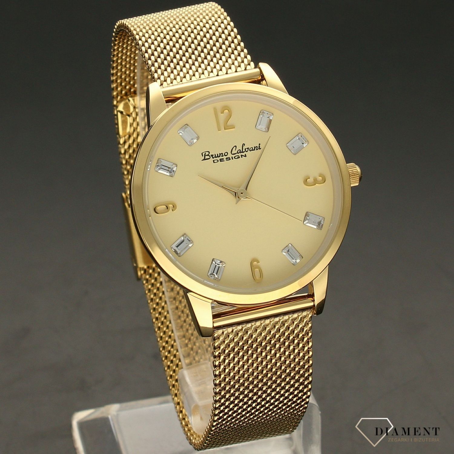 Zegarek damski BRUNO CALVANI złoty z kryształami BC90533 GOLD. Złoty zegarek damski z ozdobną tarczą. Indeksy w formie błyszczących kryształów. Zegarek damski ze stalową bransoletką typu mesh w kolorze złotym (4).jpg